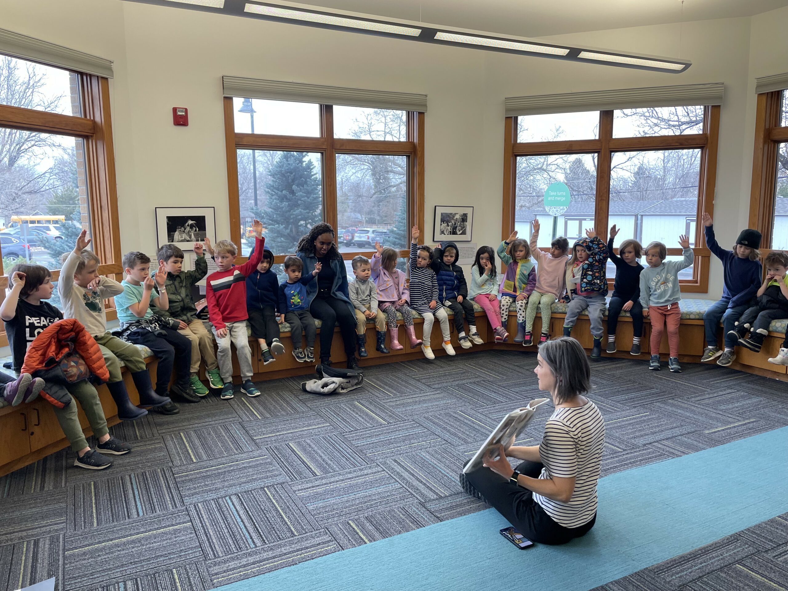 Montessori School of Denver students and teacher in library | DEIB